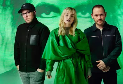 CHVRCHES debut new song "How Not to Drown" with Robert Smith from The Cure